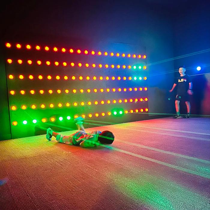 Laser maze room with intersecting light beams
